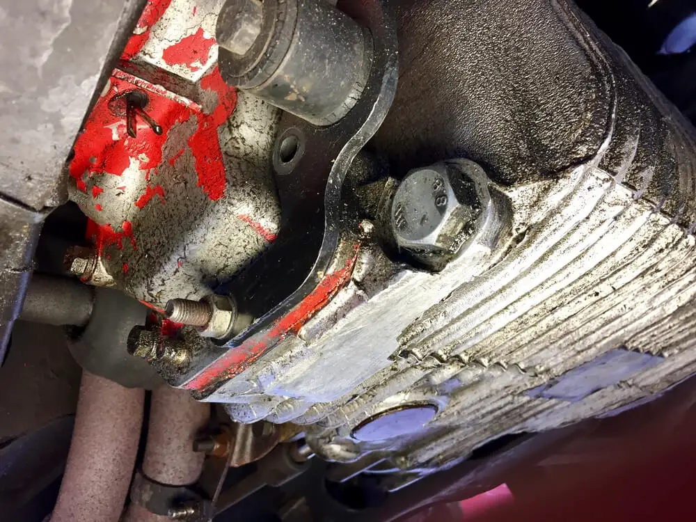 oil leaking out of exhaust manifold